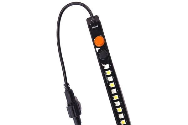 Close-up of LED strip light control buttons, DC12V input and LEDs